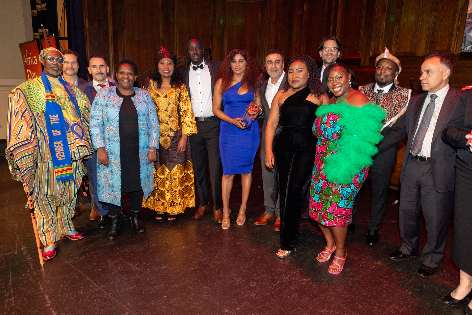 Project Sunrise team with community members at Africa Day Gala in African attire
